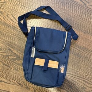 Navy Blue Picnic Storage Bag with cheese board/plastic wine glasses. Never used!